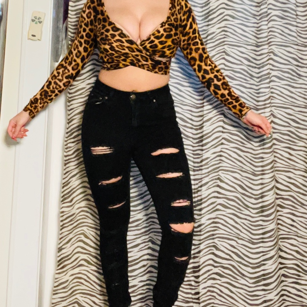 Black high waisted denim jeans with cuts